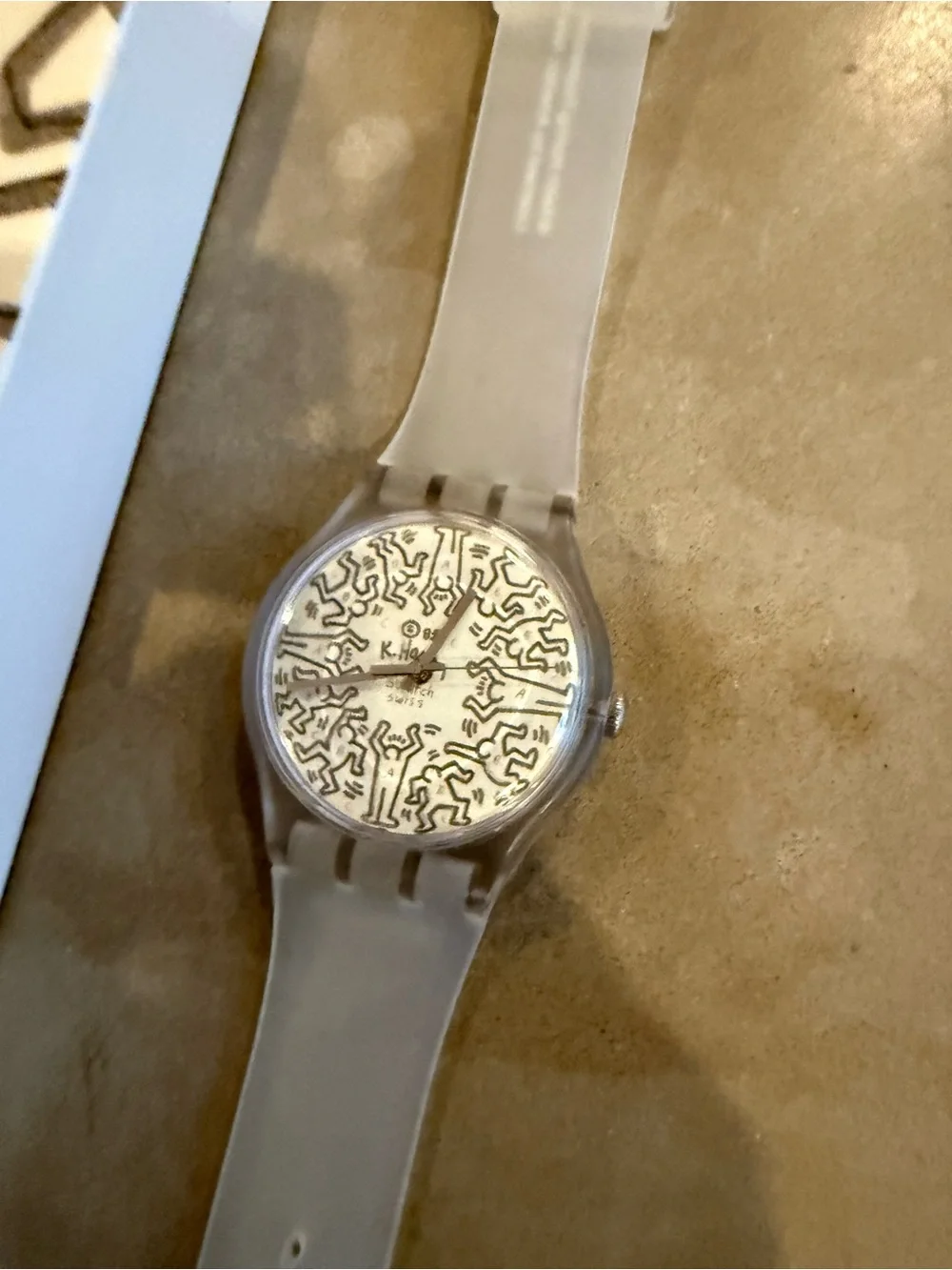 Swatch Translucent Strap Watch with White Patterned Dial